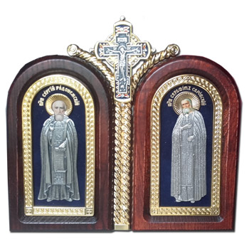 Two Russian icons in wooden frame