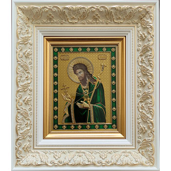 Gilded icon of St. John with decorative white frame