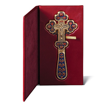 Hand cross in a red leather case