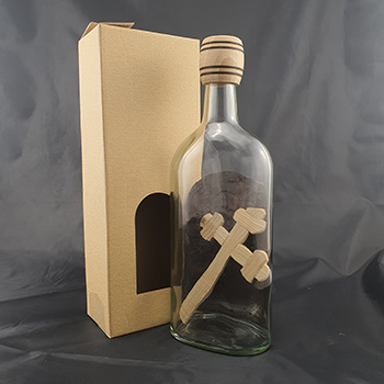 Glass bottle with cross 