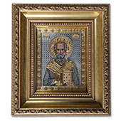 Gilded icon of St. Nicholas with decorative frame - larger