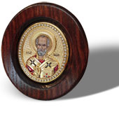 Icon of St. Nicholas in rounded wooden frame